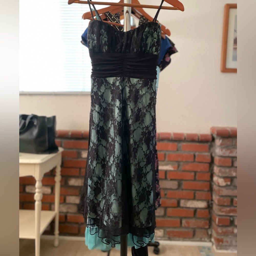 Black lace on ice blue dress
